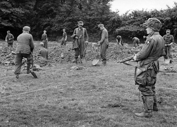 German POW dig graves 9 June 44 North France